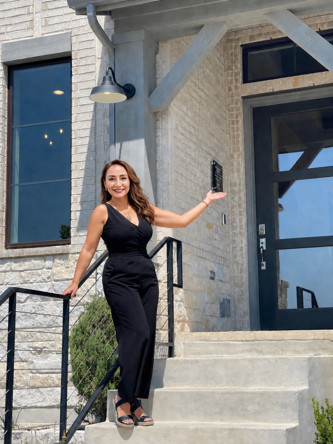 Realtor Araceli Hart welcoming clients to a luxury new-construction home in Austin, Texas